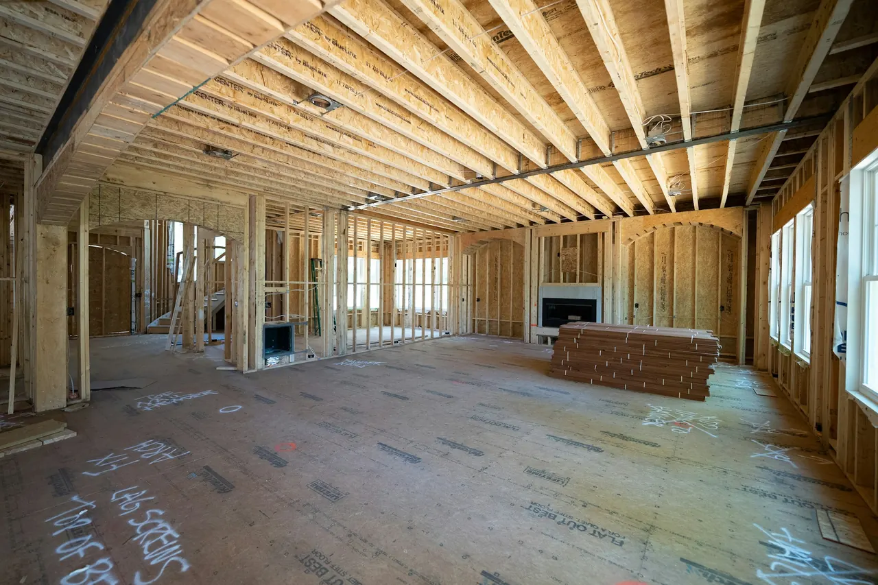 Timber wall and ceiling framing inside a new home under construction