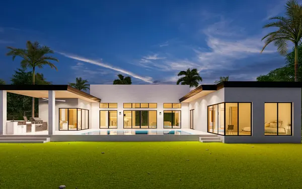 Single-storey home with fresh landscaping and garden lighting at dusk